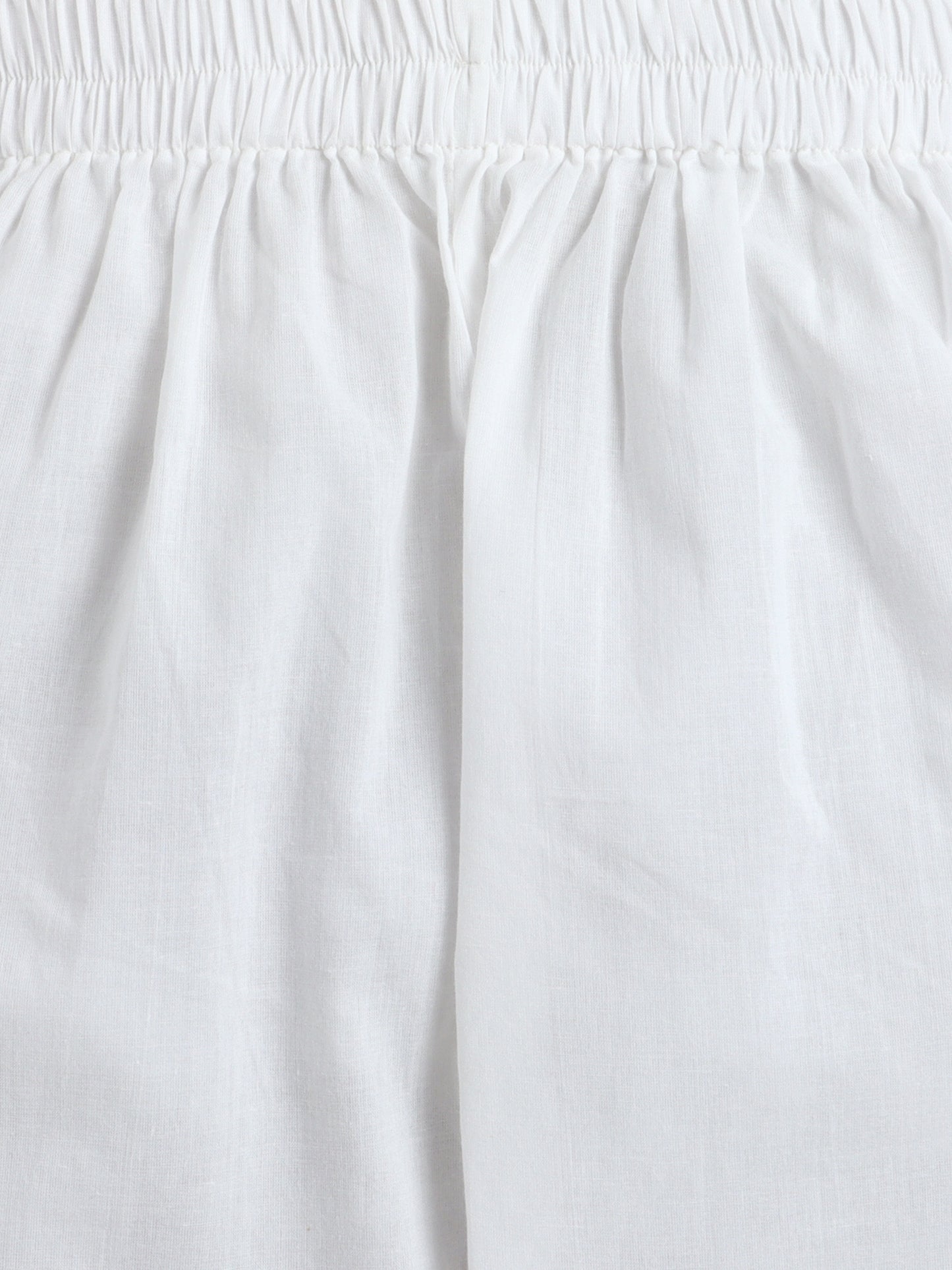 Close-up of a white skirt with an elastic waistband