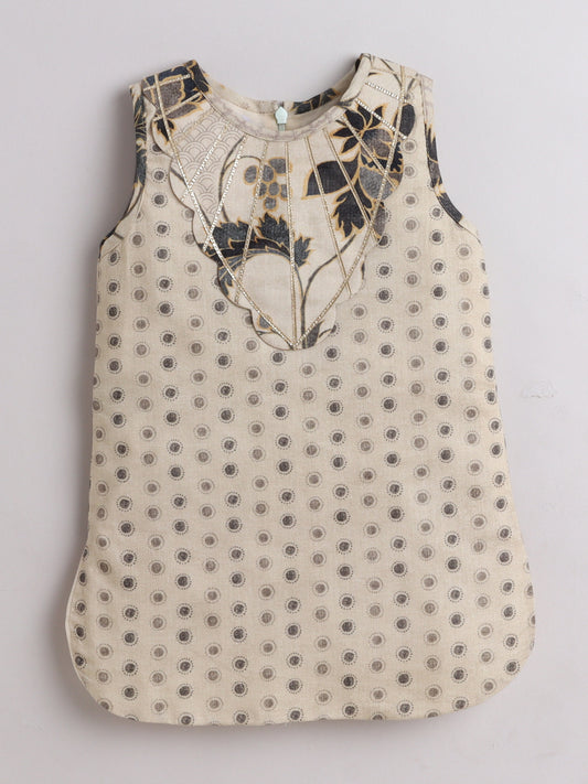 Elegant kids ethnic wear featuring a sleeveless design with floral embroidery and polka dots