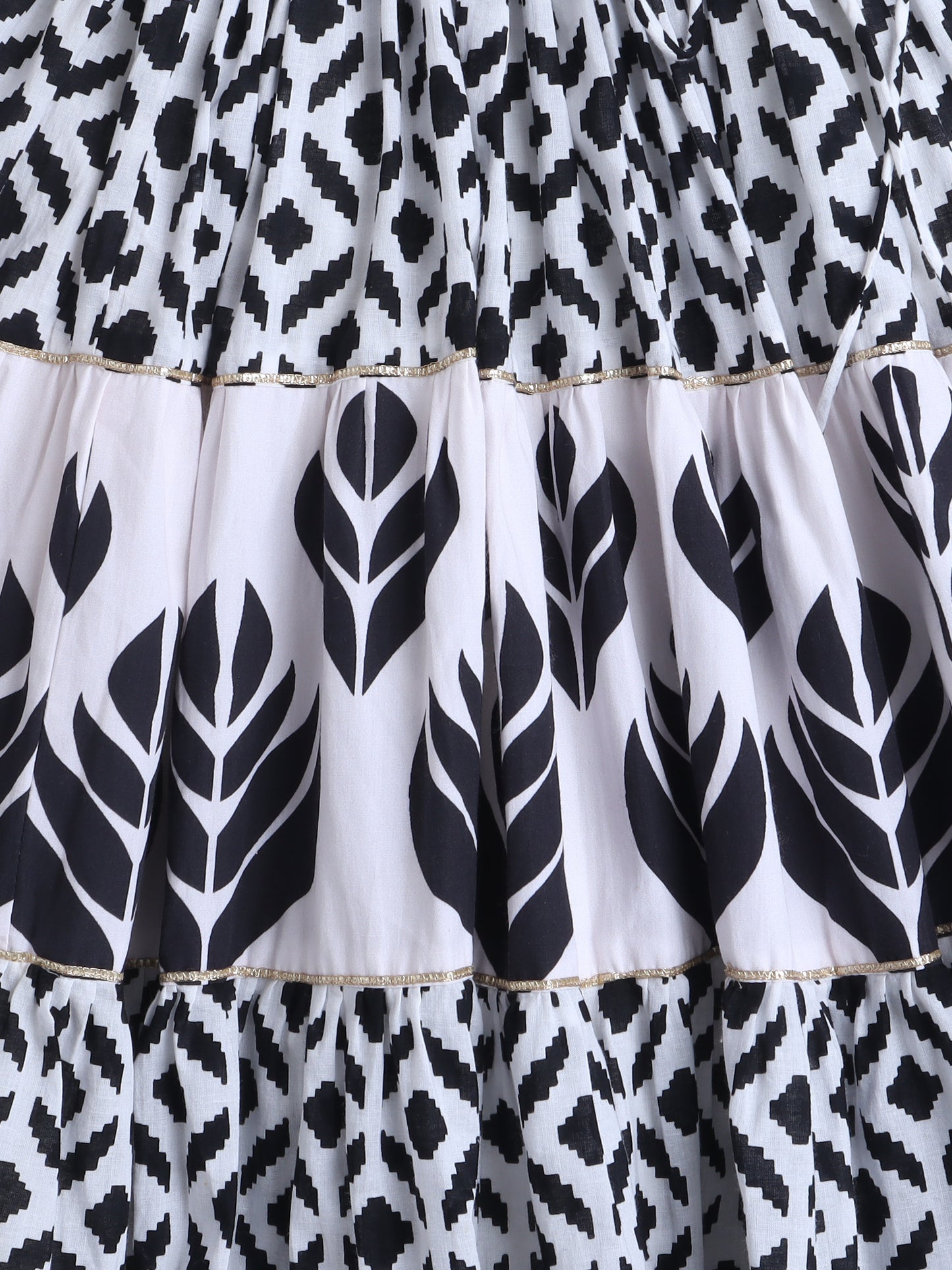 Stylish Lehenga Choli with black and white leaf patterns and a layered design