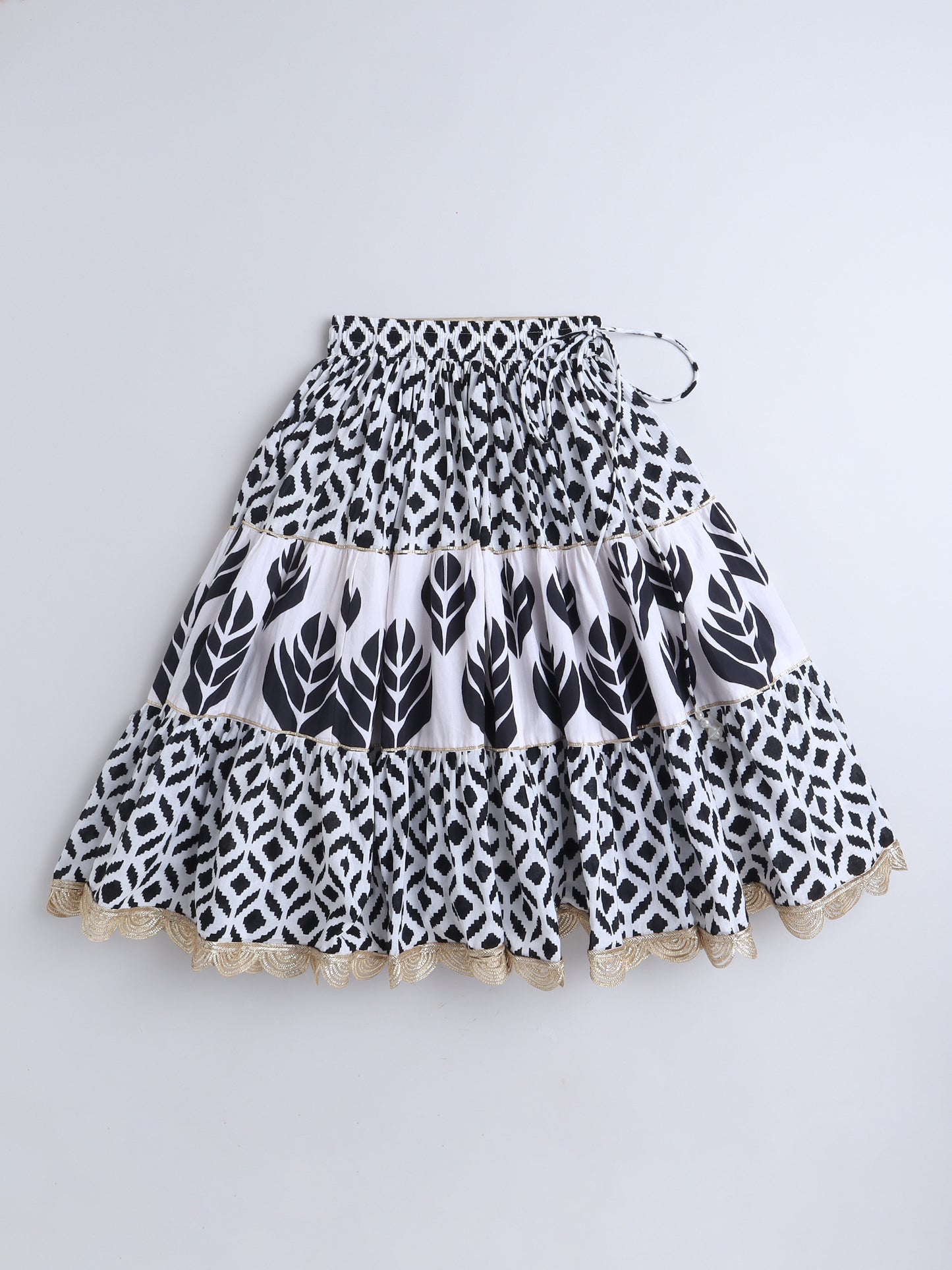 Stylish printed Lehenga Choli with intricate leaf patterns and lace trim for festive occasions