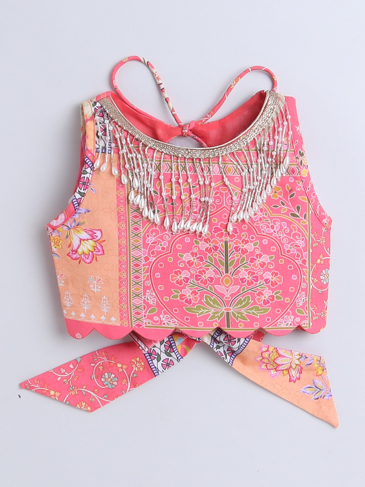 Lehenga Choli for toddlers in vibrant pink with intricate embroidery and decorative tassels