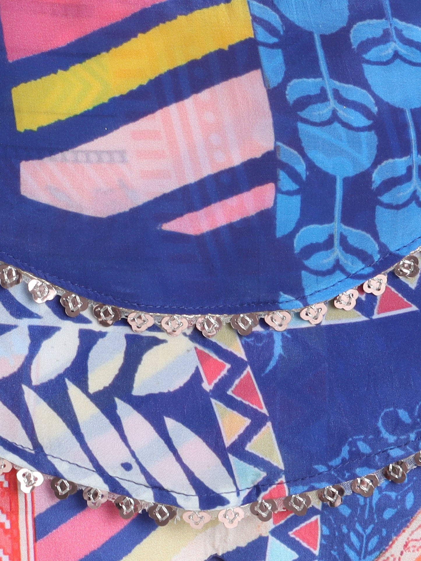 Colorful fabric with geometric patterns and decorative trim