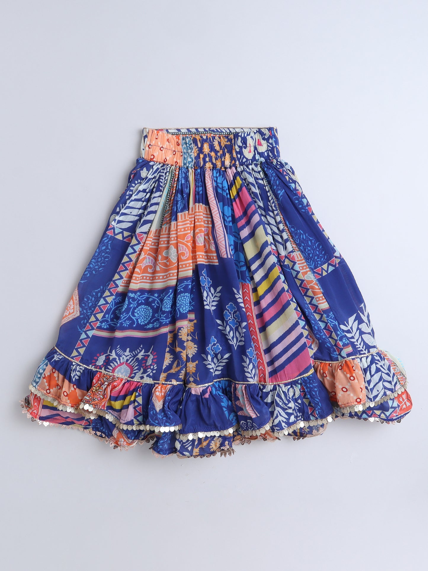 Colorful patterned skirt on a blue background