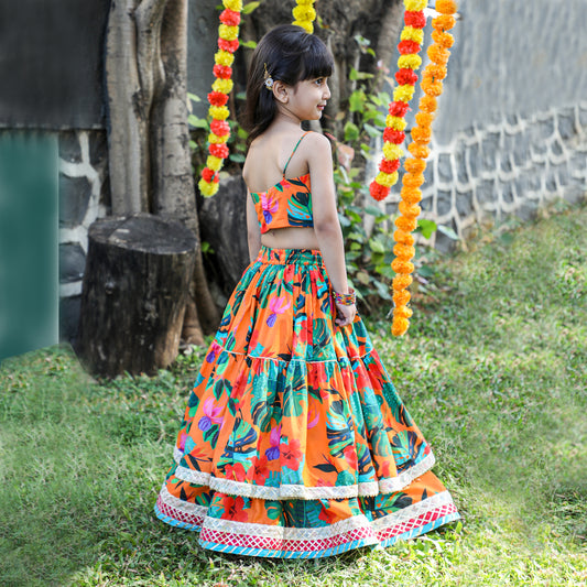 Girls Beautifully Crafted Orange Pleated Spaghetti Strap Top And Printed Layered Lehenga - funlittleones.com