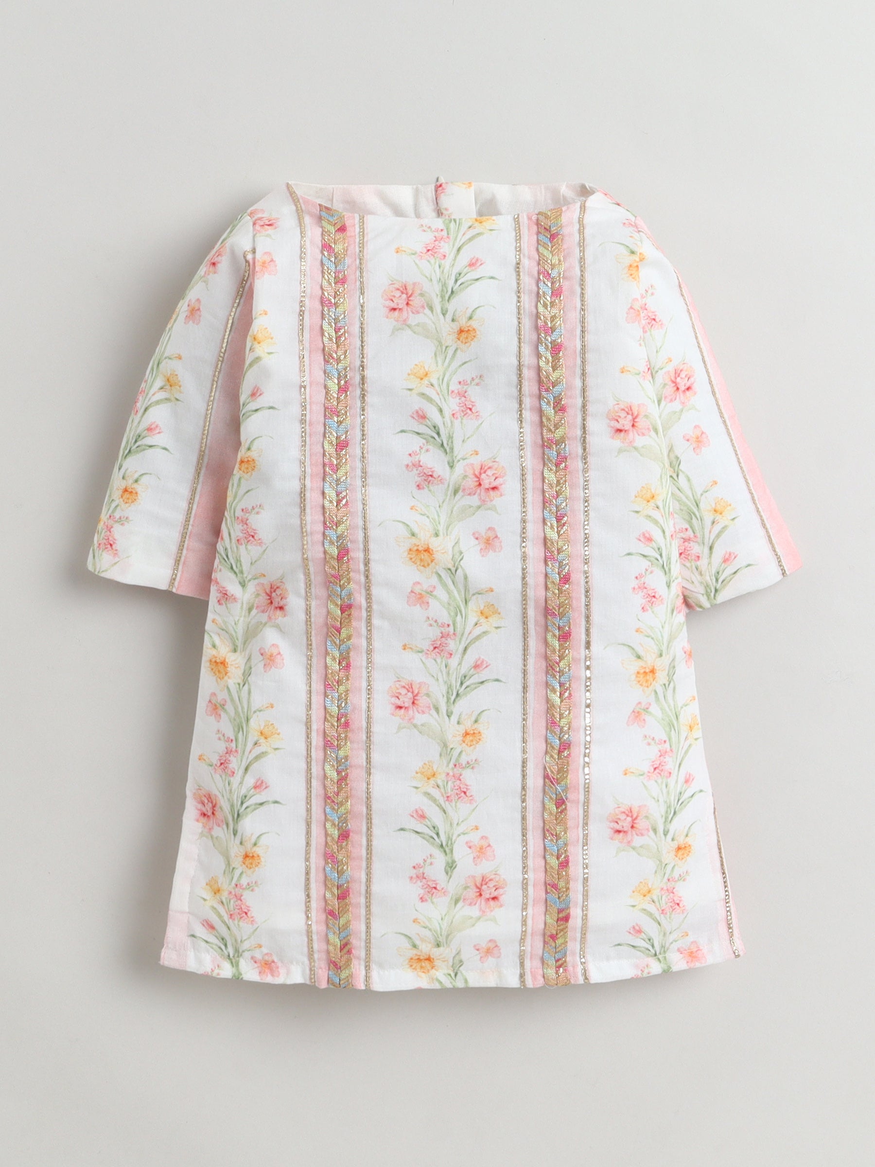 Floral patterned dress on a light gray background