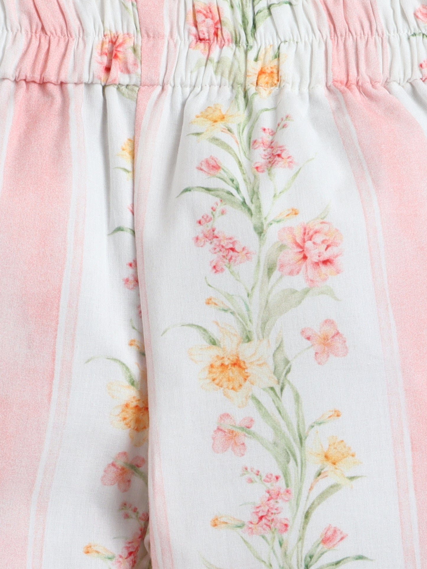 Floral-patterned pants with a soft pink border