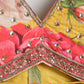 Decorative fabric with floral patterns and gold embroidery