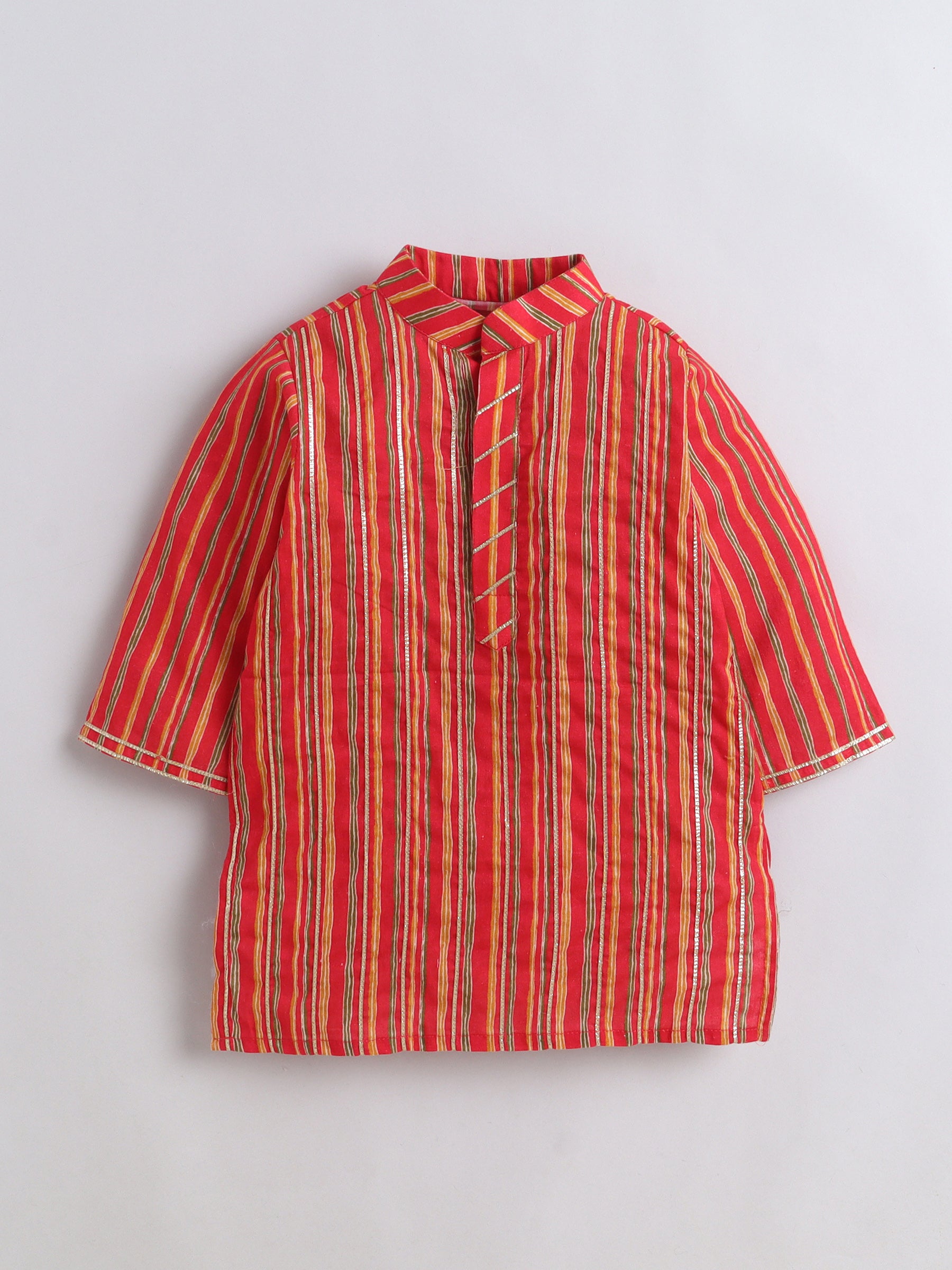 Red and orange striped shirt on a light gray background