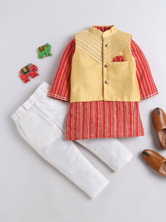 Children's outfit with red and yellow striped shirt, yellow vest, white pants, and brown shoes on a light gray background.