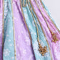 Colorful fabric with floral patterns and decorative elements on a white background