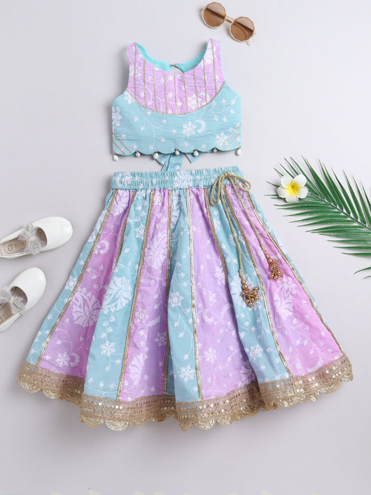 Pastel blue and lavender embroidered lehenga choli set for girls with floral thread work and pearl detailing – front view.