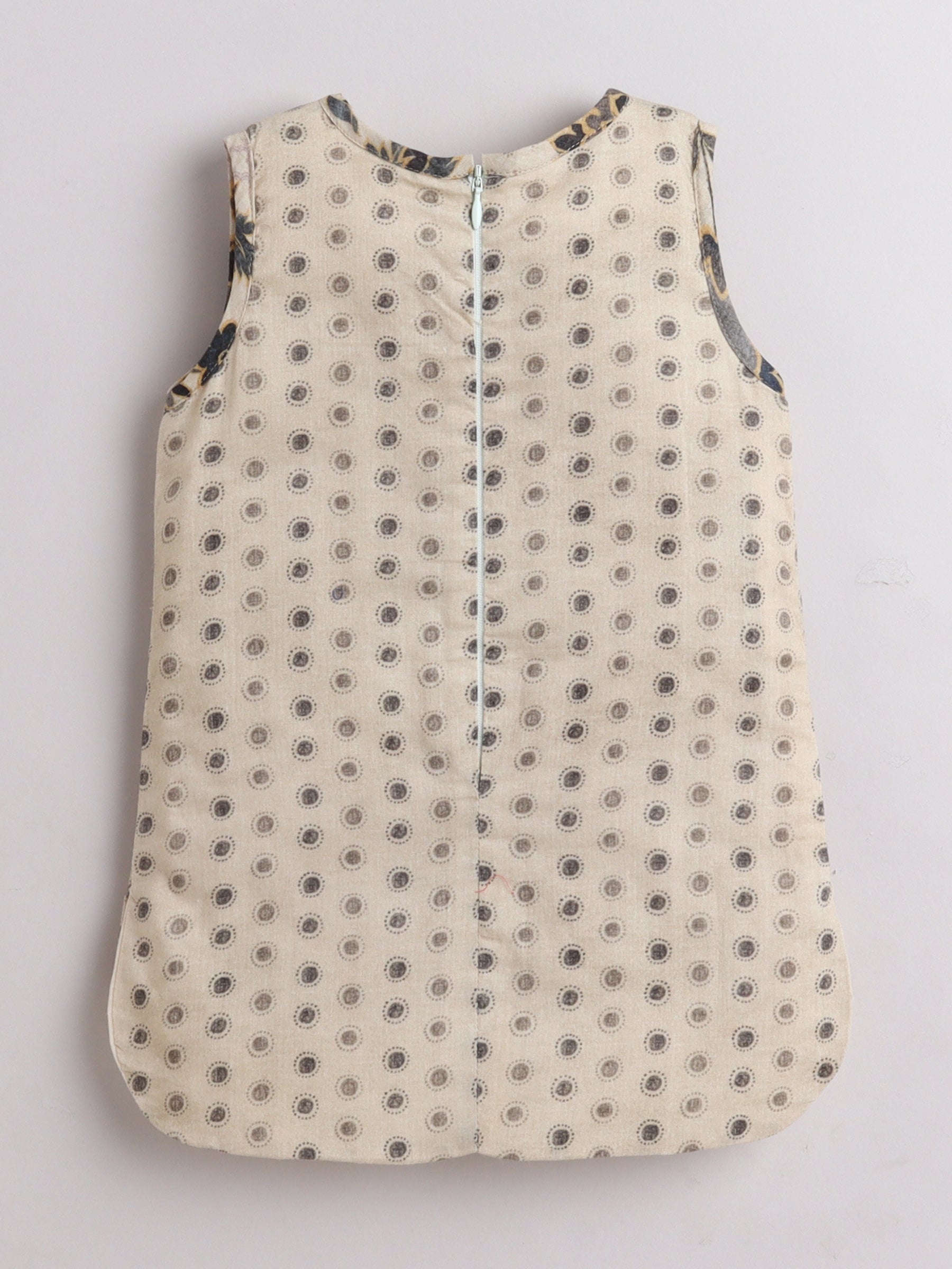 Elegant kids ethnic wear featuring a stylish back design with circular patterns