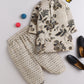 Beige cotton floral printed kurta and polka dot dhoti set for boys, displayed with accessories including black loafers, sunglasses, and colorful balls – traditional kidswear outfit from Fun Little Ones