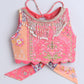 Lehenga Choli for toddlers in vibrant pink with intricate embroidery and decorative tassels