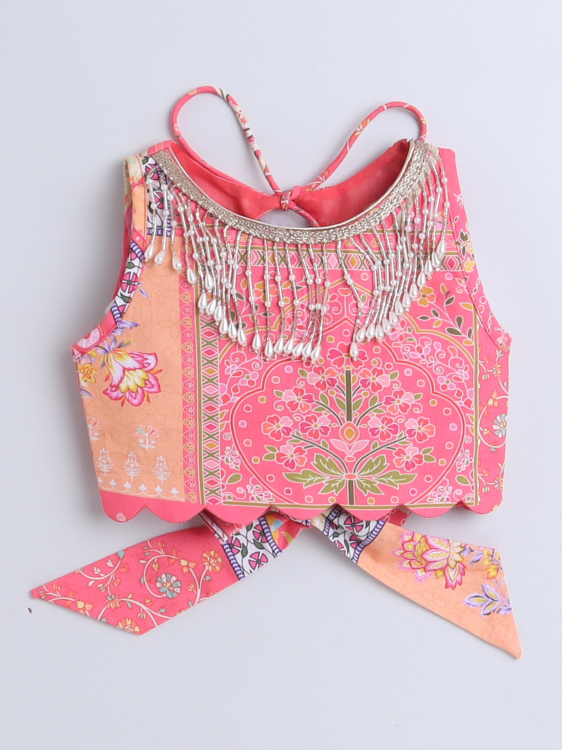 Lehenga Choli for toddlers in vibrant pink with intricate embroidery and decorative tassels