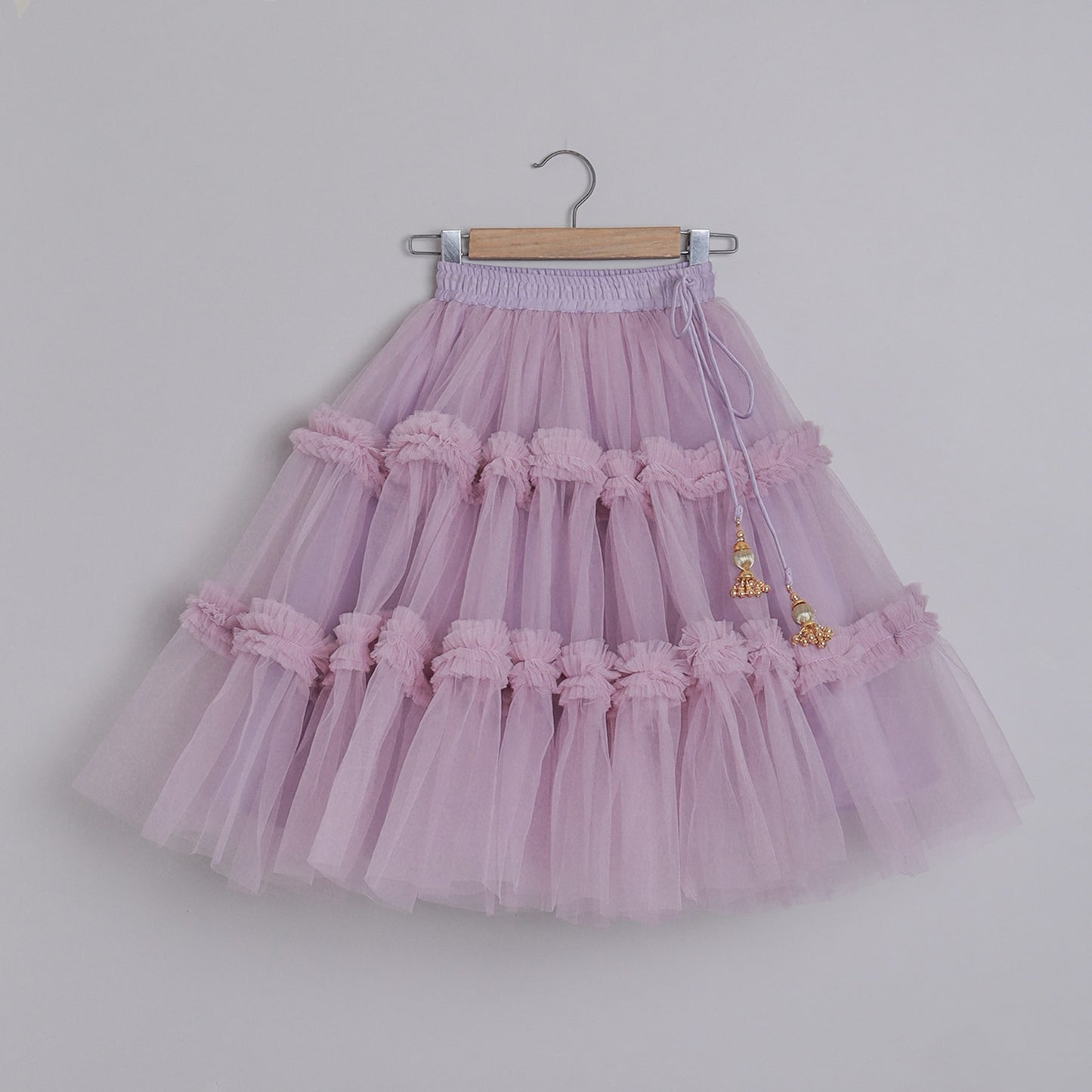 lilac tulle skirt with gold tassels