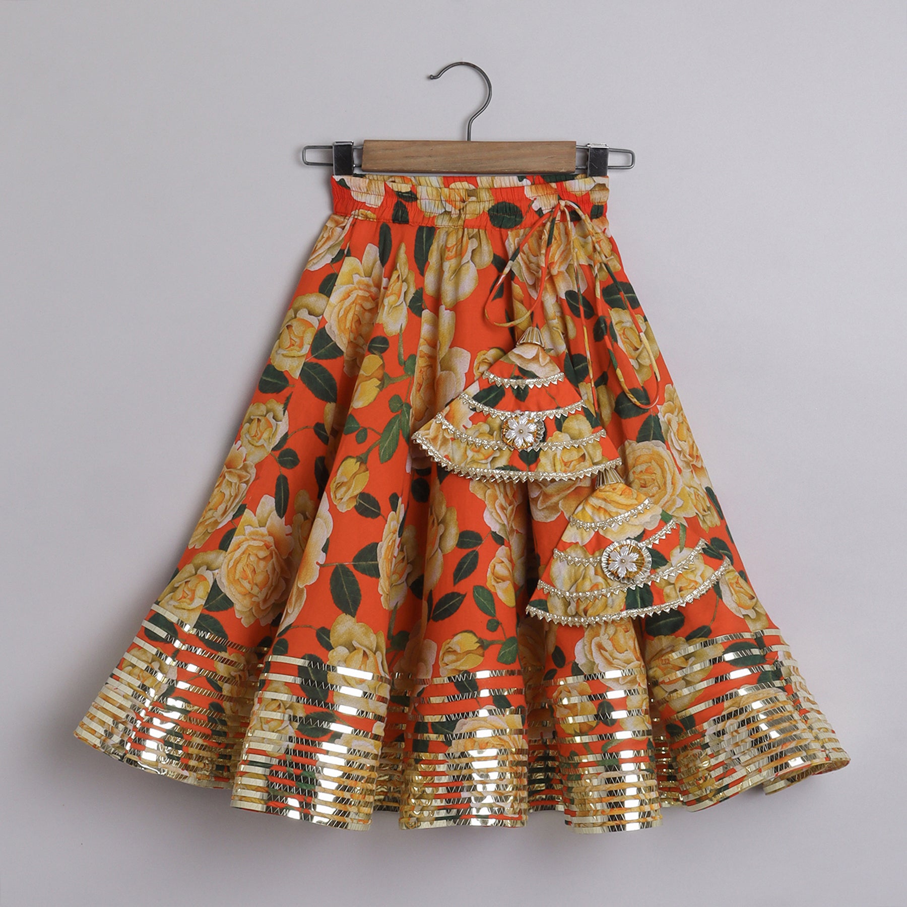Metallic Lace Detailed Sleeveless Beige Top And Floral Printed Orange Lehenga - funlittleones.com