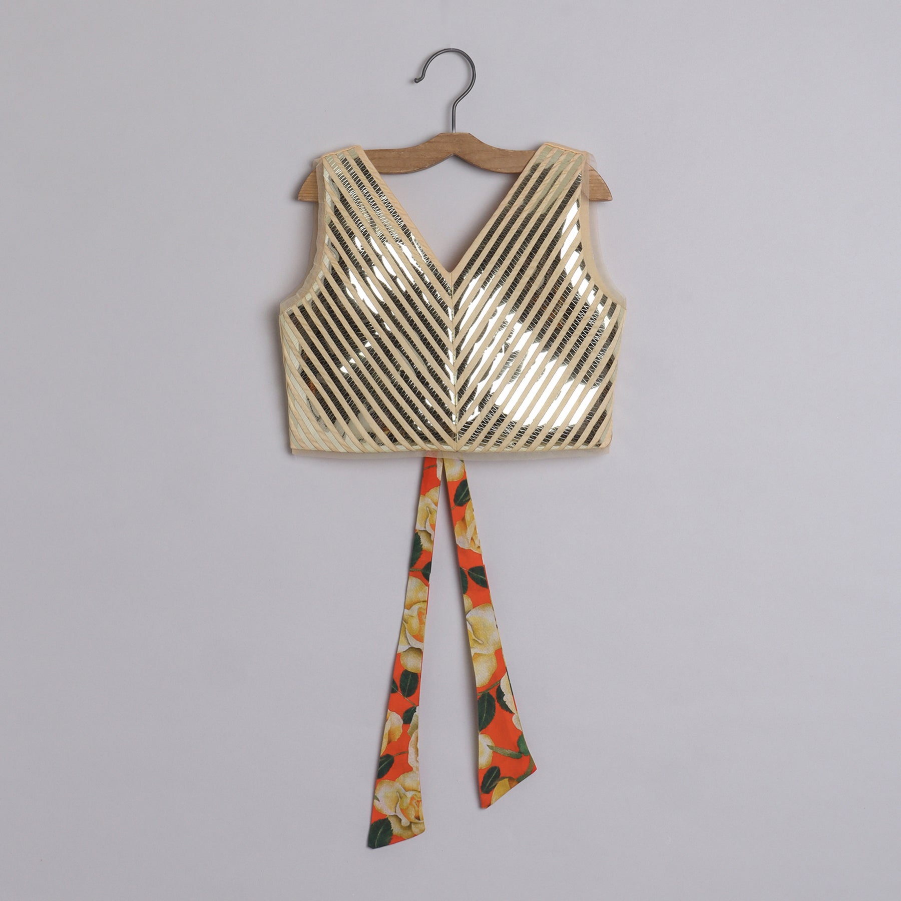 Metallic Lace Detailed Sleeveless Beige Top And Floral Printed Orange Lehenga - funlittleones.com