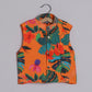 Boys Indian Pintex Orange Kurta With Hibiscus Printed Sleeveless Jacket And Pyjama - funlittleones.com